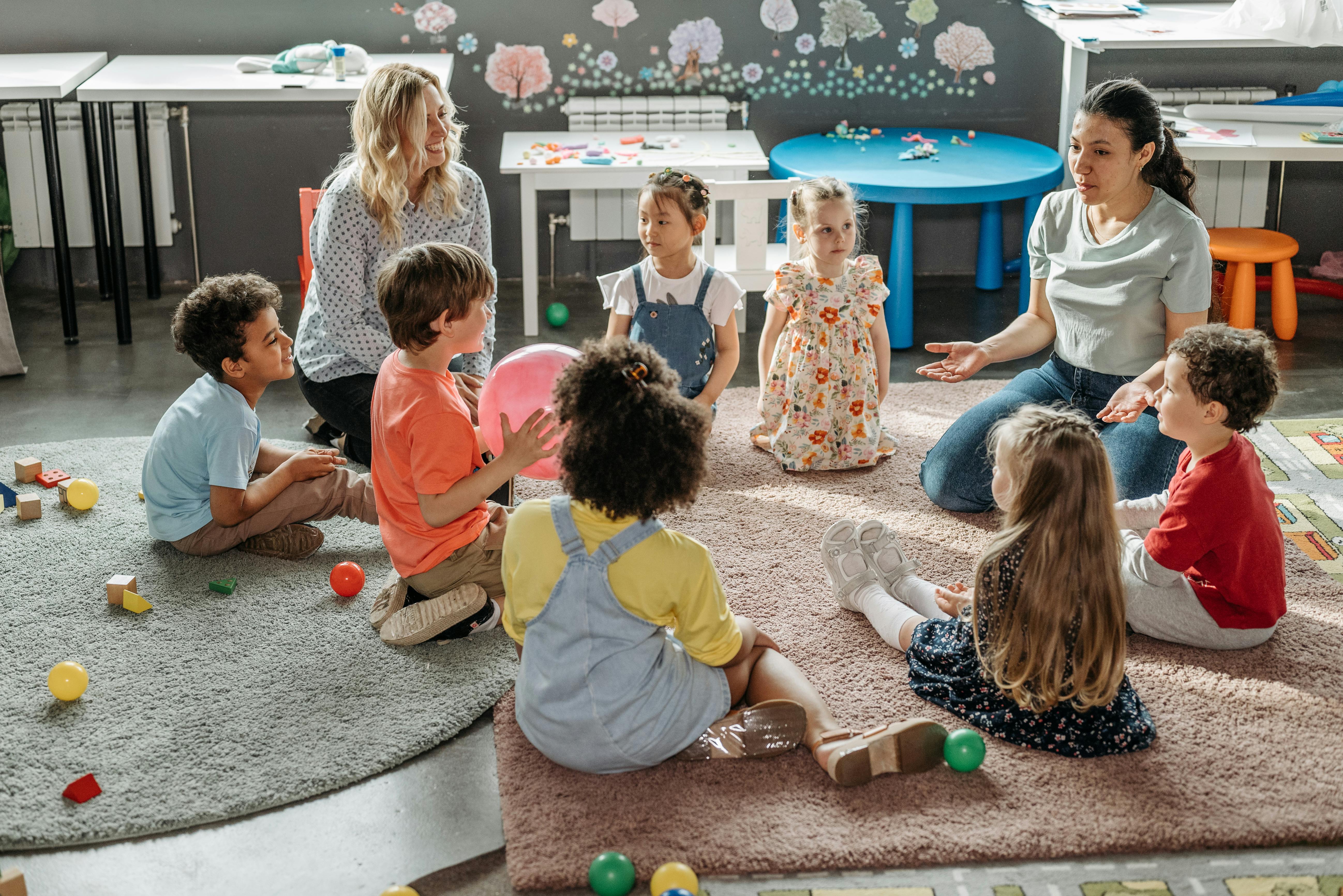 Teacher engaging with children